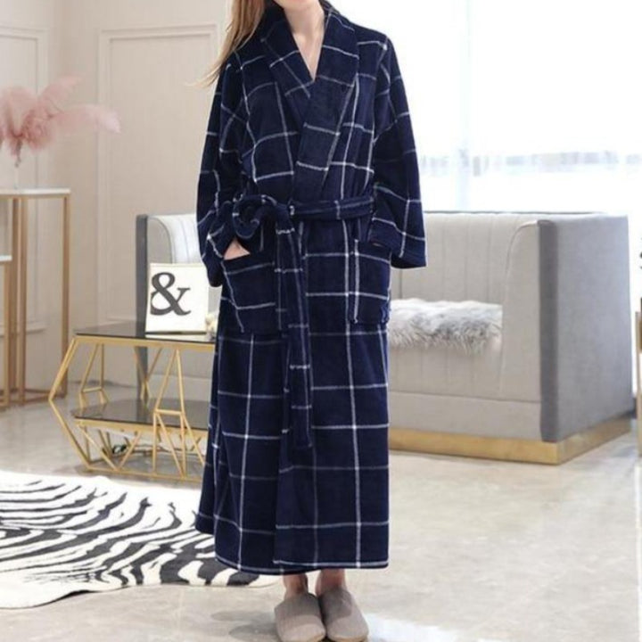 Woman in blue and white long plaid spa bathrobe 