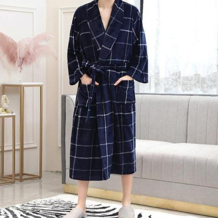 man in  blue and white long plaid spa bathrobe 